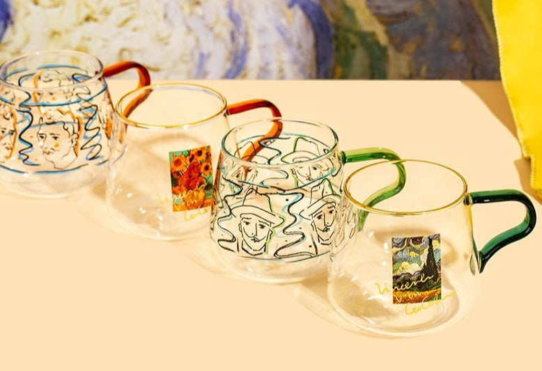 rounded clear glass van gogh-design mug with orange green handle