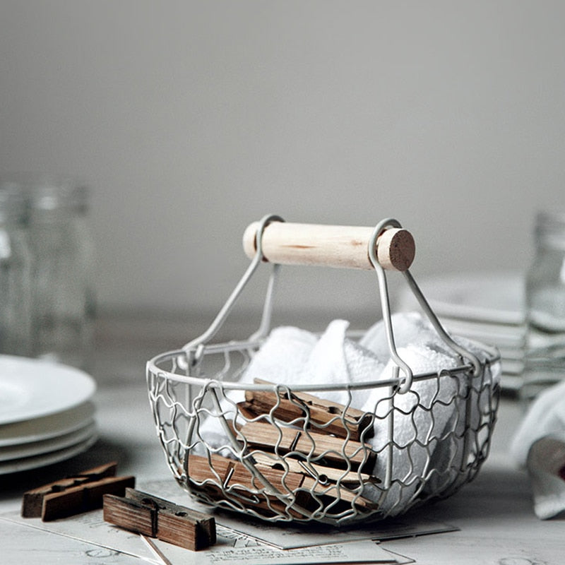 rectangle webbed wrought iron basket with wooden handle