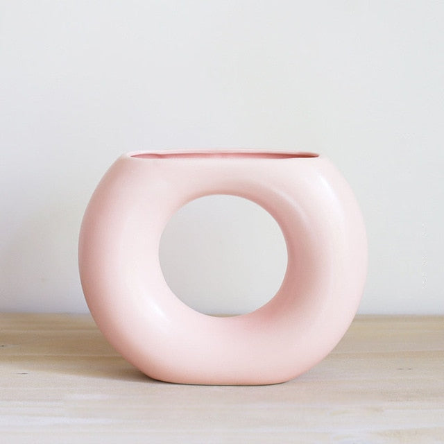 round abstract pink grainy matte glossy finish ceramic vase