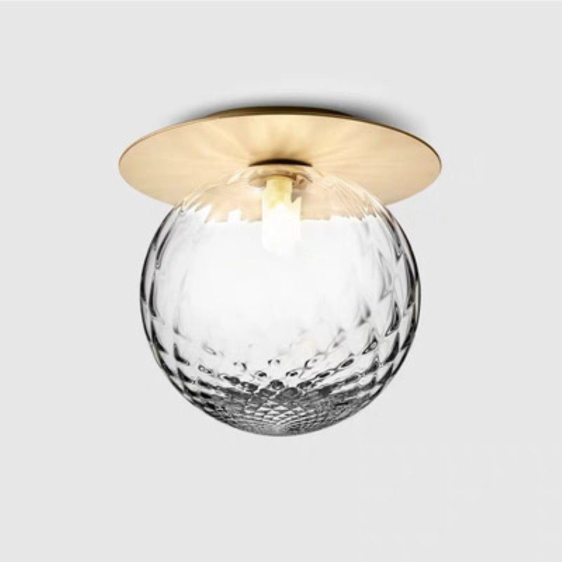 sphere globe gold metal plate clear glass ceiling light Nuura Liila 1 Wall lamp