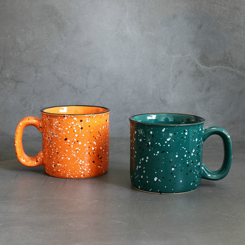 paint splatter ceramic mug orange green