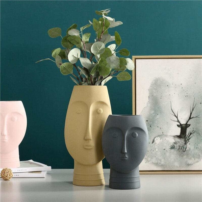 yellow and grey Face Ceramic Vases