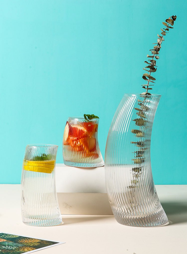 curved water or cocktail glass and jar
