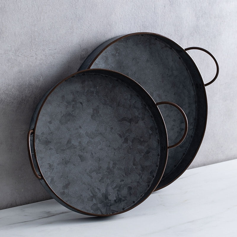 round black casted iron tray