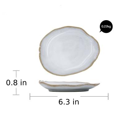 round abstract gold trim edges white ceramic plate