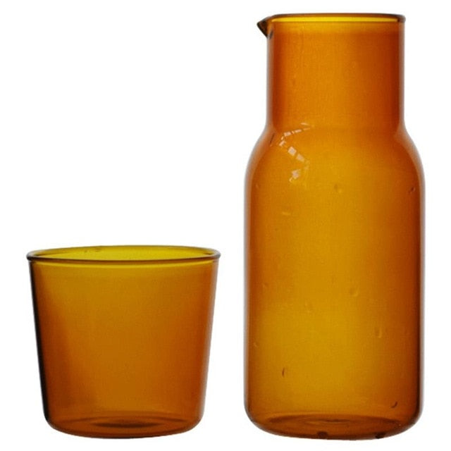 vibrant colored glass water jar and cup