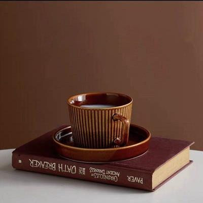 round textured stripe brown ceramic cup with matching saucer