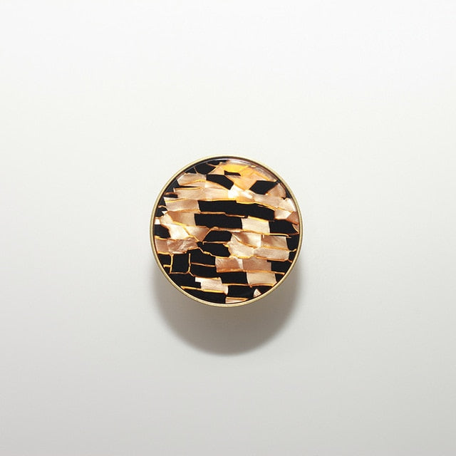 round color marbled brass cabinet knob and pulls