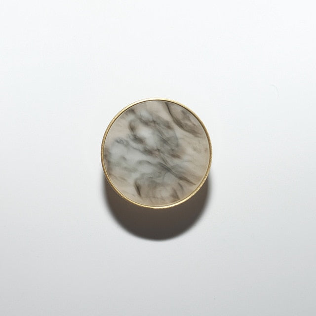round color marbled brass cabinet knob and pulls