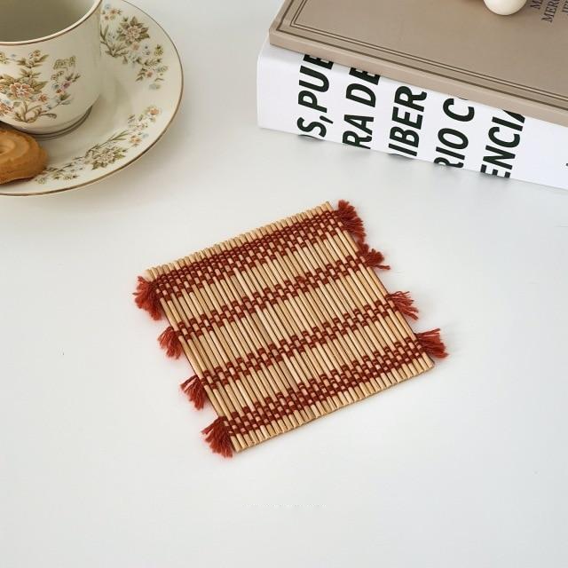 square handwoven beige and red placemat
