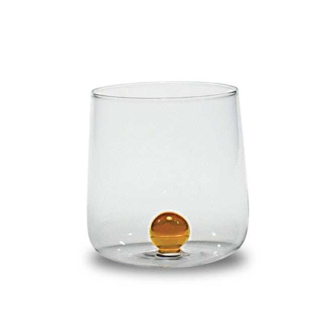 round acrylic Glass Vibrant clear cup with yellow ball