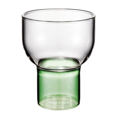 round clear glass cup with green base