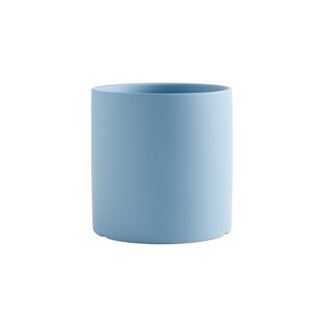 round cylindrical pastel blue ceramic flower pot