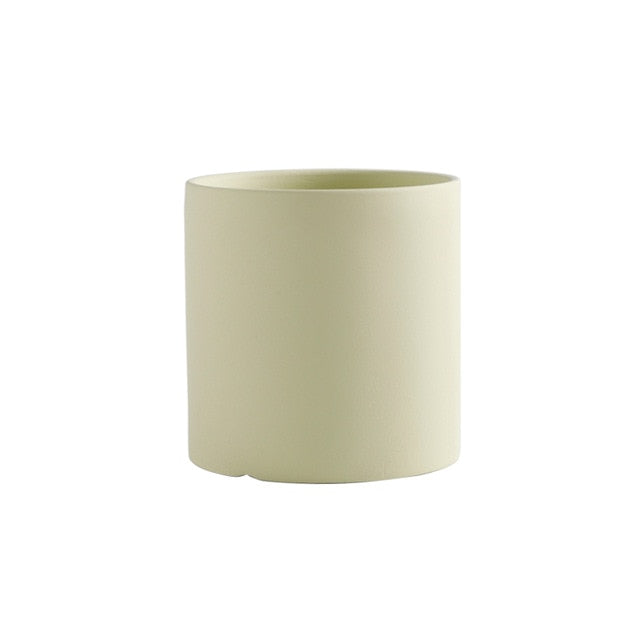 round cylindrical white ceramic flower pot