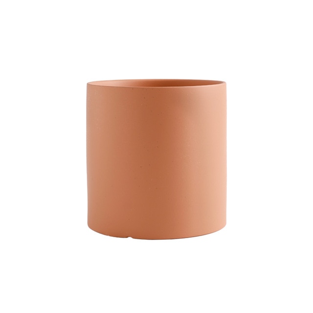 round cylindrical pale orange ceramic flower pot