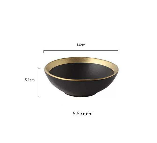 black bowl with gold rim